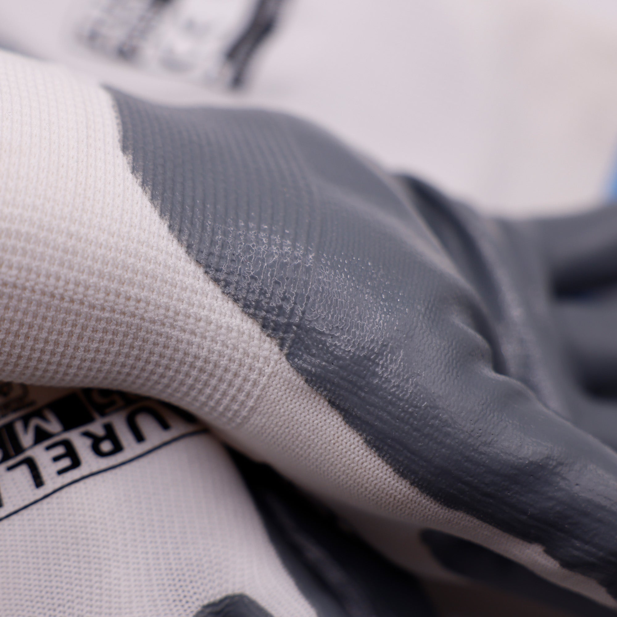 Aurelia 205 - 13gg Grey Nitrile Palm Coated Glove with a White Nylon Liner